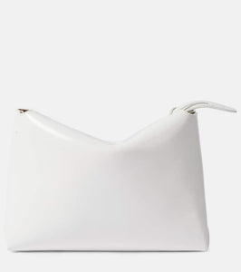 Khaite Lina patent leather shoulder bag. Shop Khaite Clutches for women now.