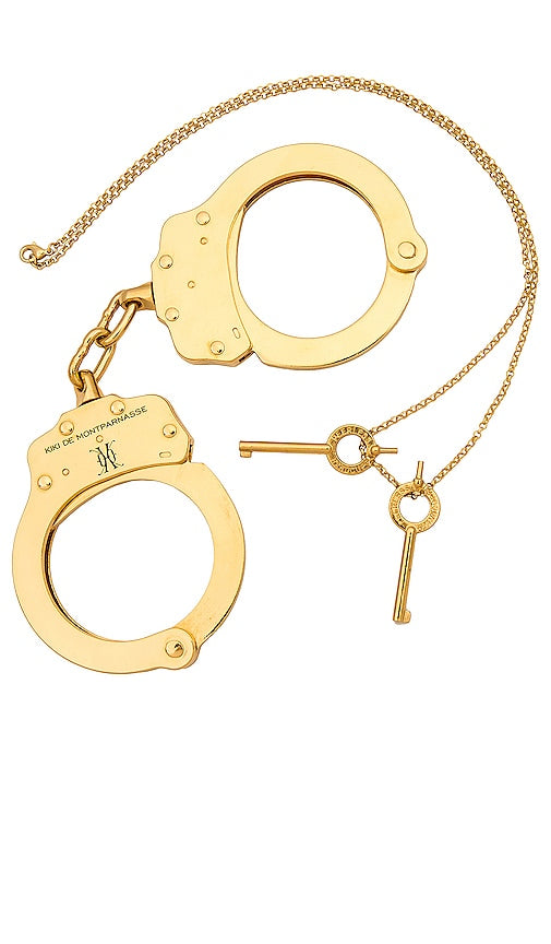 Kiki de Montparnasse Gold Handcuffs in Metallic Gold - Menottes dorées Kiki de Montparnasse en or métallisé - Kiki de Montparnasse 金属金手铐 - Kiki de Montparnasse Goldhandschellen in Metallic-Gold - 메탈릭 골드 소재의 Kiki de Montparnasse 골드 수갑 - Manette d'oro di Kiki de Montparnasse in oro metallizzato