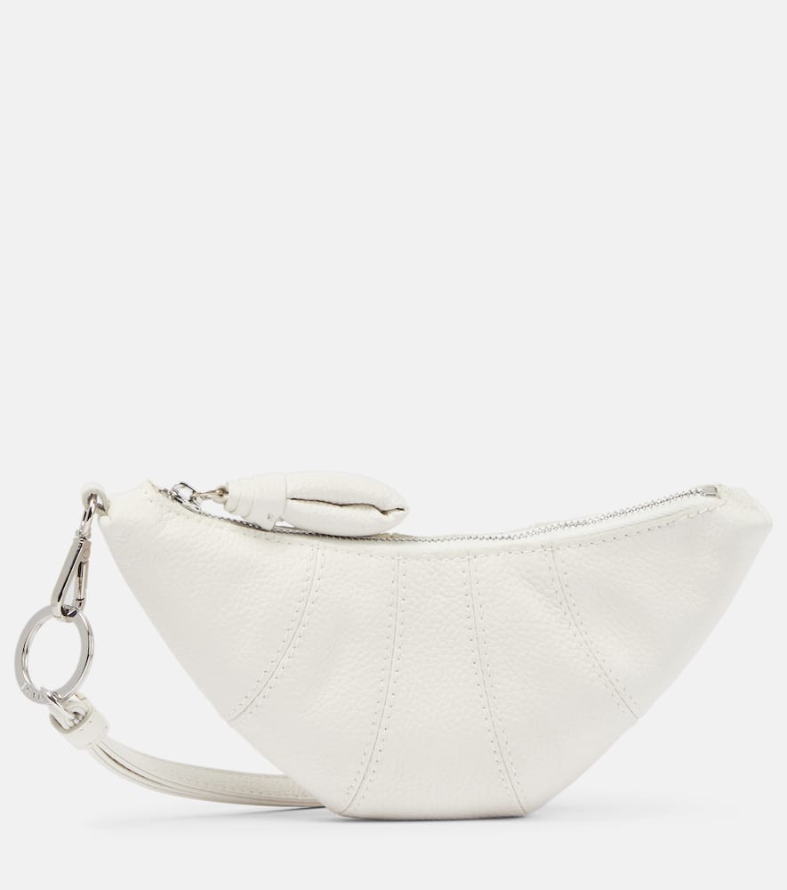 Lemaire Croissant leather coin purse with strap. Shop Lemaire Shoulder Bags for women now.