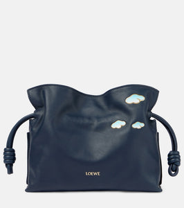 Loewe Flamenco Mini leather clutch. Shop Loewe Clutches for women now.