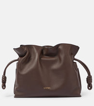 Loewe Flamenco Mini leather clutch. Shop Loewe Clutches for women now.