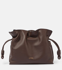 Loewe Flamenco Mini leather clutch. Shop Loewe Clutches for women now.