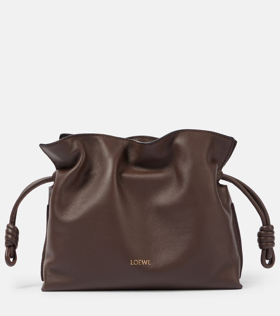 Loewe Flamenco Mini leather clutch. Shop Loewe Clutches for women now.