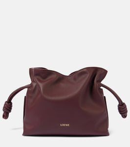 Loewe Flamenco Mini leather clutch. Shop Loewe Clutches for women now.