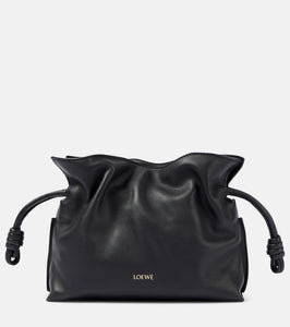 Loewe Flamenco Mini leather clutch. Shop Loewe Clutches for women now.