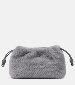 Loewe Flamenco Small faux fur clutch. Shop Loewe Clutches for women now.