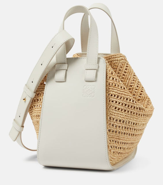 Loewe Hammock Compact raffia shoulder bag. Shop Loewe Top-Handle Bags for women now.