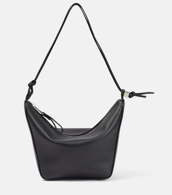 Loewe Hammock Mini leather shoulder bag. Shop Loewe Shoulder Bags for women now.