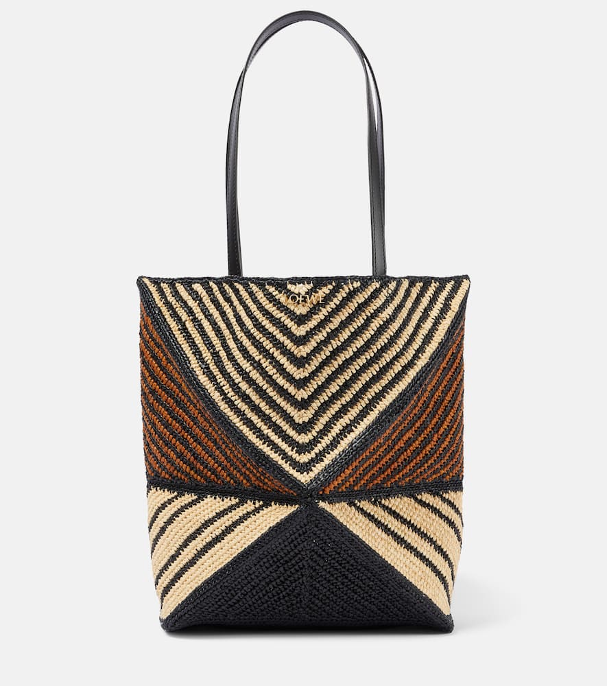 Loewe Paula's Ibiza Puzzle Fold Medium raffia tote bag. Shop Loewe Tote Bags for women now.