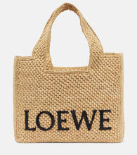Loewe Paula's Ibiza Small logo raffia tote bag. Shop Loewe Top-Handle Bags for women now.
