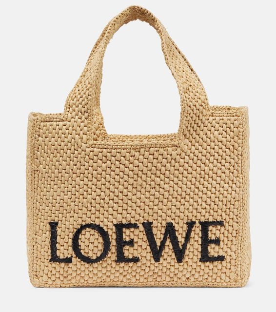 Loewe Paula's Ibiza Small logo raffia tote bag. Shop Loewe Top-Handle Bags for women now.