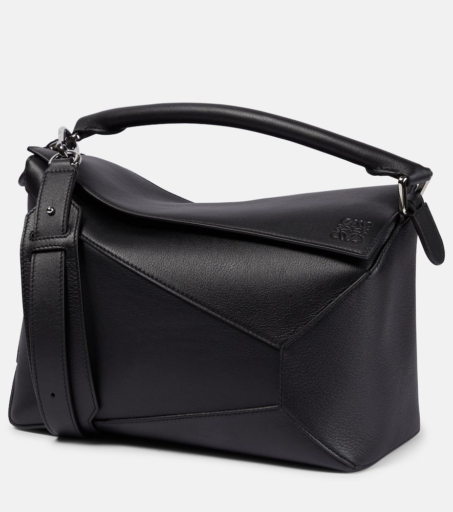 Loewe Puzzle Edge Medium leather shoulder bag. Shop Loewe Top-Handle Bags for women now.