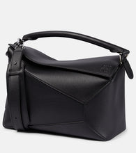 Loewe Puzzle Edge Medium leather shoulder bag. Shop Loewe Top-Handle Bags for women now.