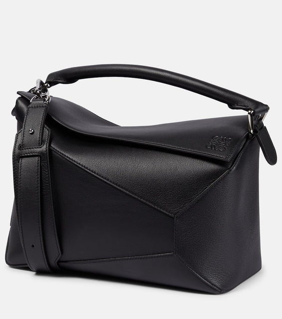 Loewe Puzzle Edge Medium leather shoulder bag. Shop Loewe Top-Handle Bags for women now.