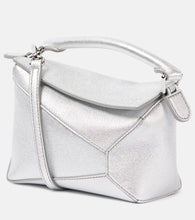 Loewe Puzzle Edge Mini leather crossbody bag. Shop Loewe Top-Handle Bags for women now.