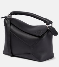 Loewe Puzzle Edge Mini leather shoulder bag. Shop Loewe Top-Handle Bags for women now.