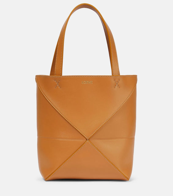 Loewe Puzzle Fold Mini leather tote bag. Shop Loewe Shoulder Bags for women now.