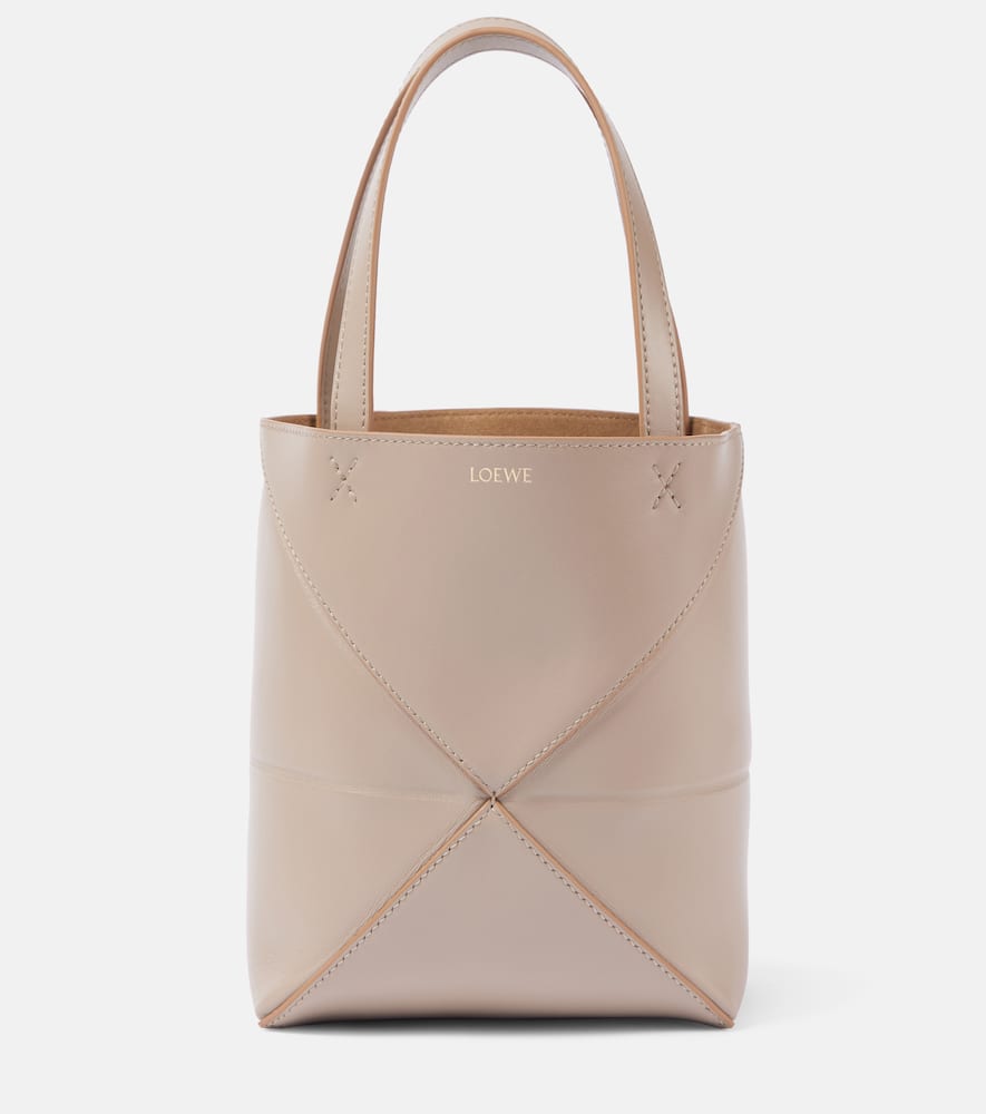 Loewe Puzzle Fold Mini leather tote bag. Shop Loewe Top-Handle Bags for women now.