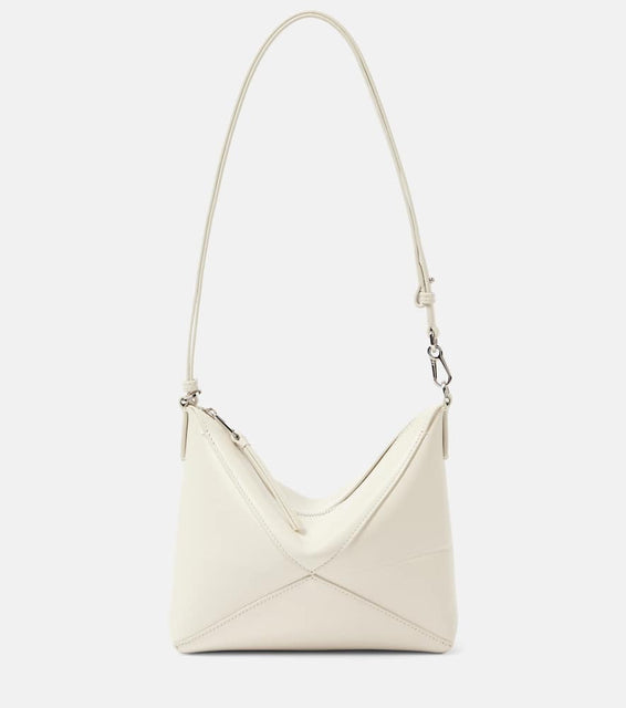 Loewe Puzzle Fold leather clutch. Shop Loewe Shoulder Bags for women now.