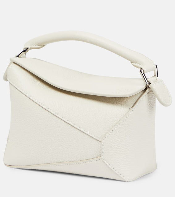 Loewe Puzzle Mini leather shoulder bag. Shop Loewe Top-Handle Bags for women now.