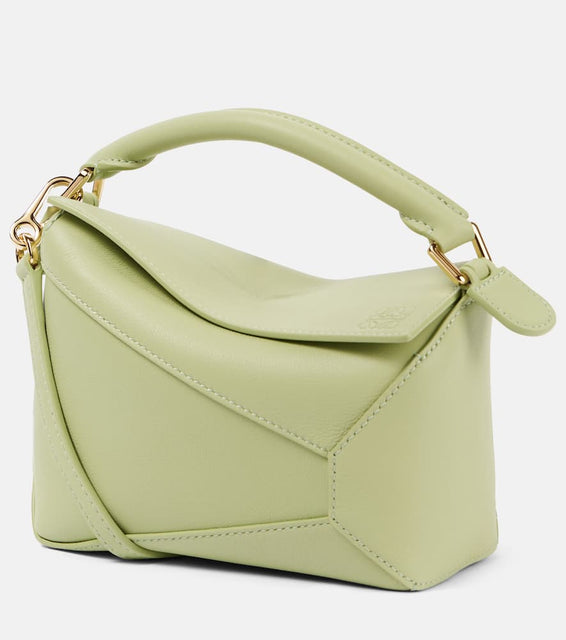 Loewe Puzzle Mini leather shoulder bag. Shop Loewe Top-Handle Bags for women now.