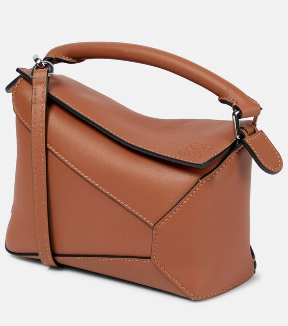 Loewe Puzzle Mini leather shoulder bag. Shop Loewe Shoulder Bags for women now.