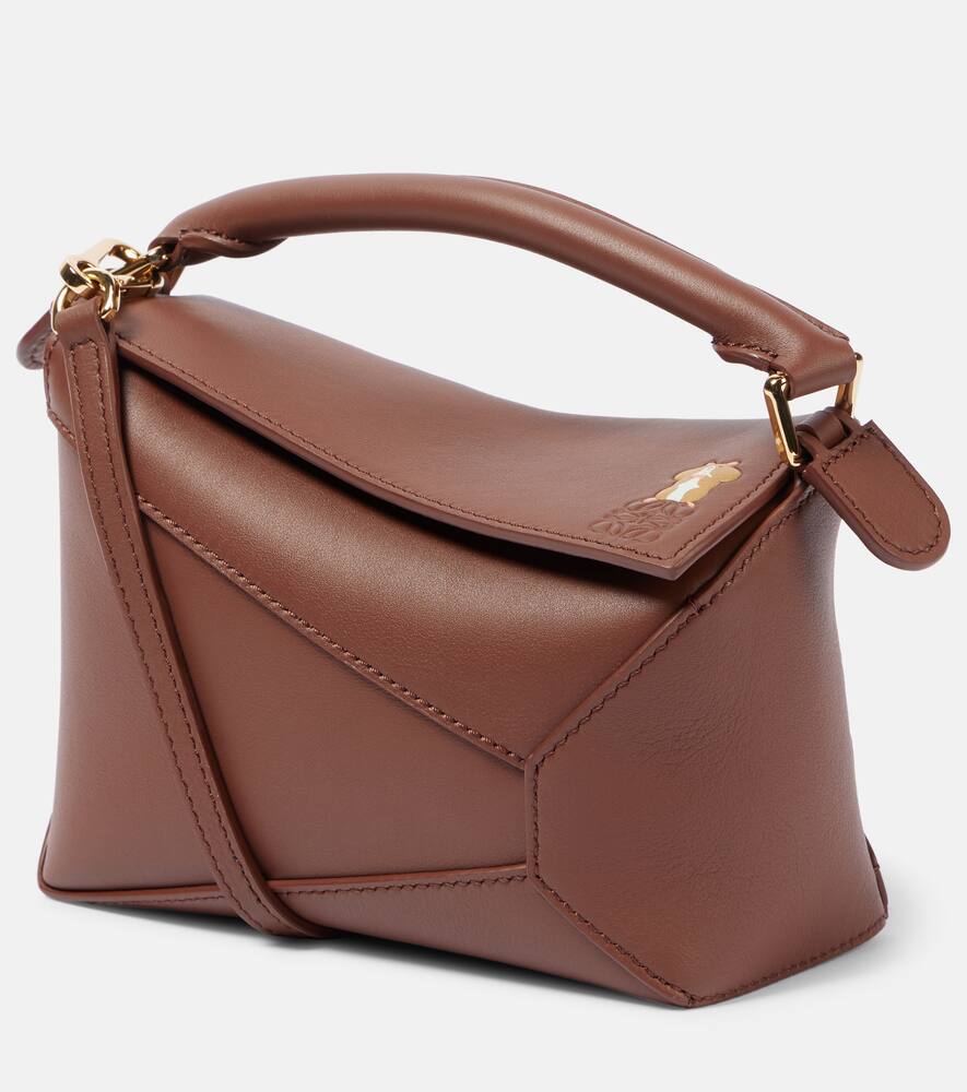 Loewe x Suna Fujita Puzzle Edge Hamster Mini crossbody bag. Shop Loewe Top-Handle Bags for women now.