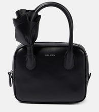 Magda Butrym Brigette floral-appliqu√É¬© leather tote bag. Shop Magda Butrym Top-Handle Bags for women now.