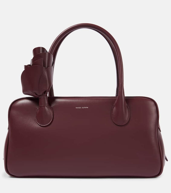 Magda Butrym Brigitte leather tote bag. Shop Magda Butrym Top-Handle Bags for women now.