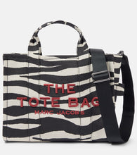 Marc Jacobs Medium canvas tote bag. Shop Marc Jacobs Tote Bags for women now.