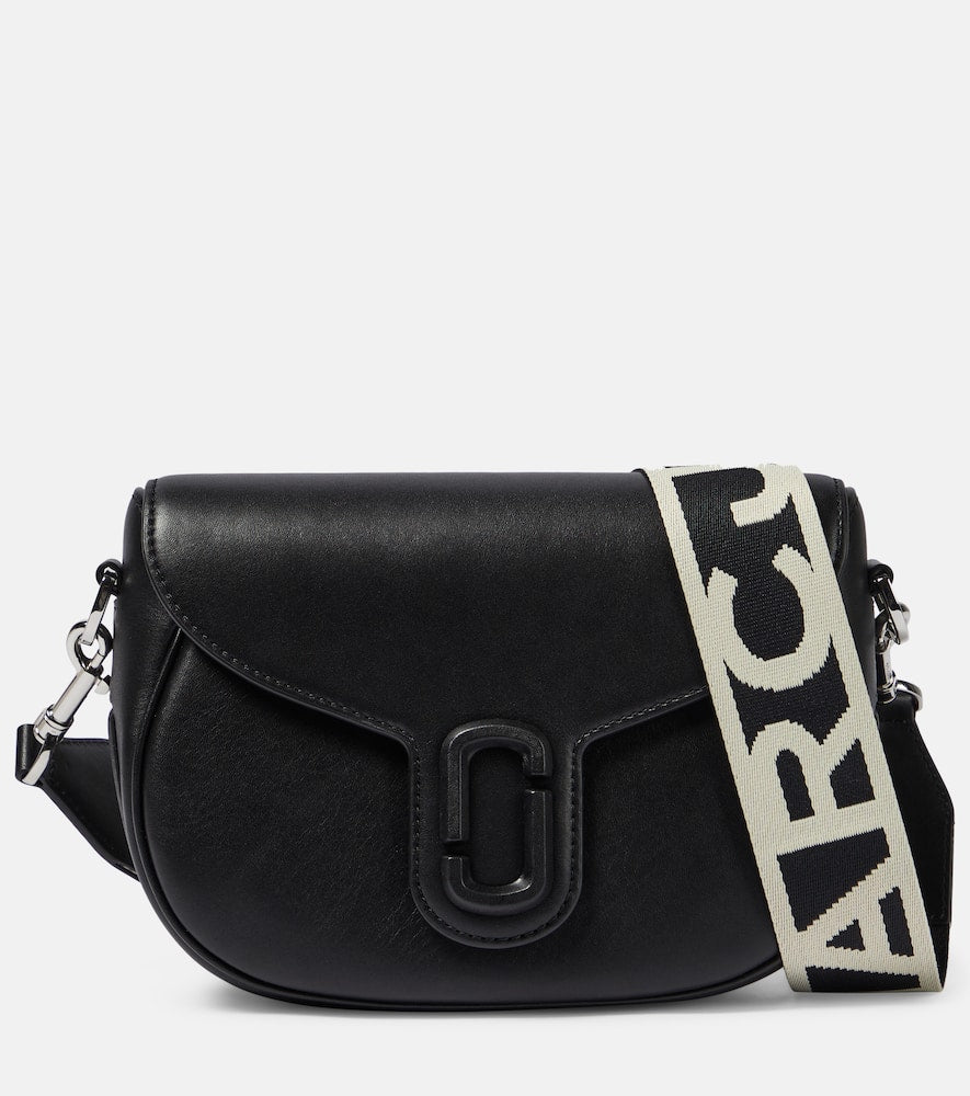 Marc Jacobs The J Marc Saddle leather crossbody bag. Shop Marc Jacobs Crossbody Bags for women now.
