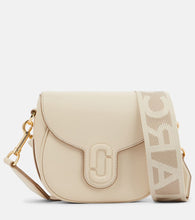 Marc Jacobs The J Marc Small leather saddle bag. Shop Marc Jacobs Shoulder Bags for women now.