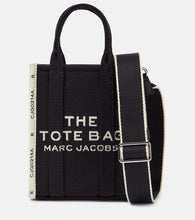 Marc Jacobs The Jacquard canvas phone pouch. Shop Marc Jacobs Shoulder Bags for women now.