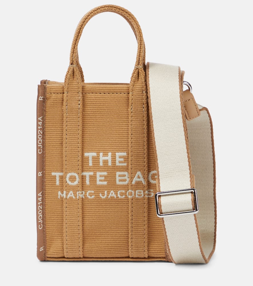 Marc Jacobs The Jacquard canvas phone pouch. Shop Marc Jacobs Shoulder Bags for women now.