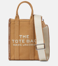 Marc Jacobs The Jacquard canvas phone pouch. Shop Marc Jacobs Shoulder Bags for women now.