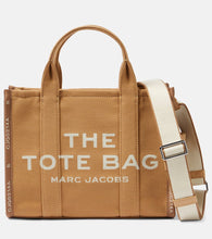 Marc Jacobs The Large canvas tote bag. Shop Marc Jacobs Tote Bags for women now.