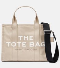 Marc Jacobs The Medium canvas tote bag. Shop Marc Jacobs Tote Bags for women now.