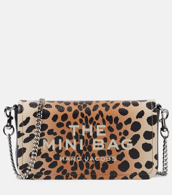 Marc Jacobs The Mini cheetah-print leather crossbody bag. Shop Marc Jacobs Crossbody Bags for women now.