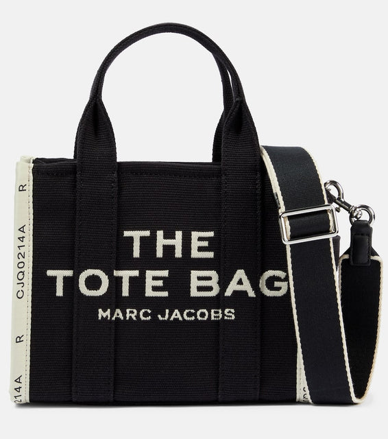 Marc Jacobs The Small canvas tote bag. Shop Marc Jacobs Crossbody Bags for women now.