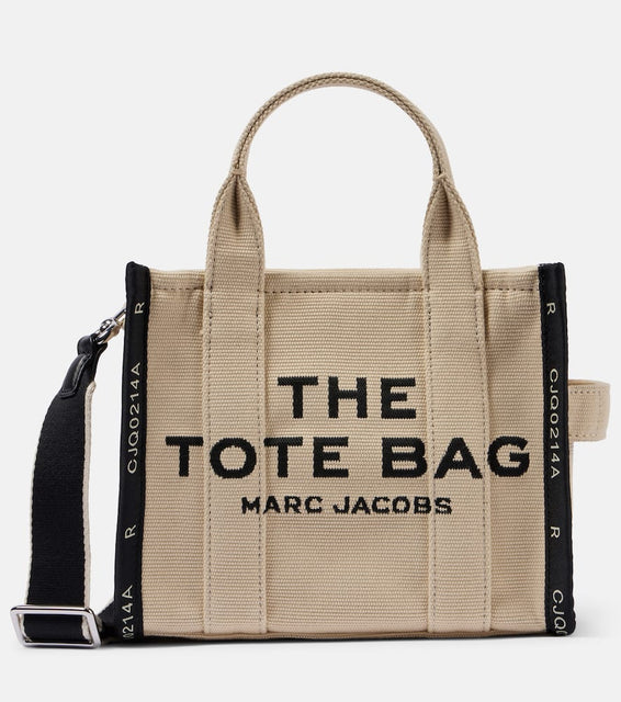 Marc Jacobs The Small canvas tote bag. Shop Marc Jacobs Tote Bags for women now.