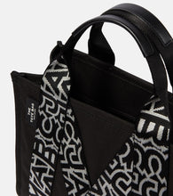 Marc Jacobs The Traveler canvas tote bag