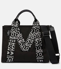 Marc Jacobs The Traveler canvas tote bag. Shop Marc Jacobs Tote Bags for women now.