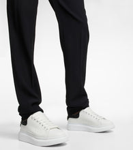 McQueen Oversized embellished leather sneakers
