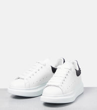 McQueen Oversized embellished leather sneakers