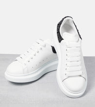 McQueen Oversized embellished leather sneakers