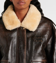Miu Miu Logo faux shearling-trimmed leather jacket