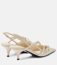 Miu Miu Patent leather slingback pumps