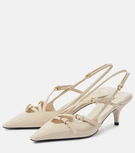 Miu Miu Patent leather slingback pumps