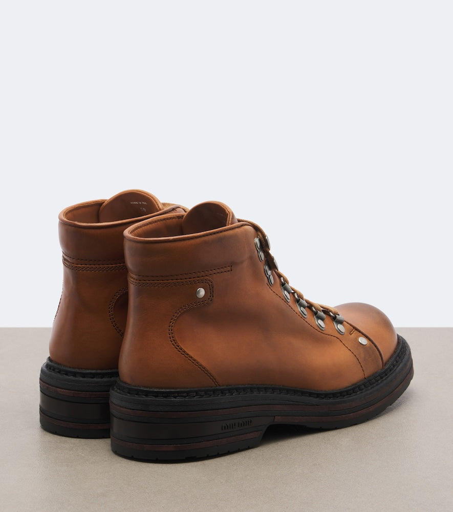 Miu Miu Leather lace-up boots in Brown - Flat Boots