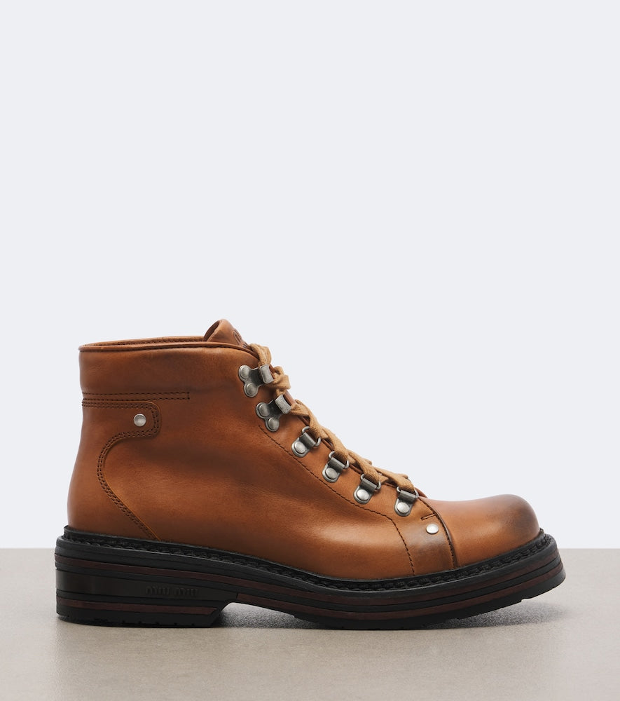 Miu Miu Leather lace-up boots in Brown - Flat Boots